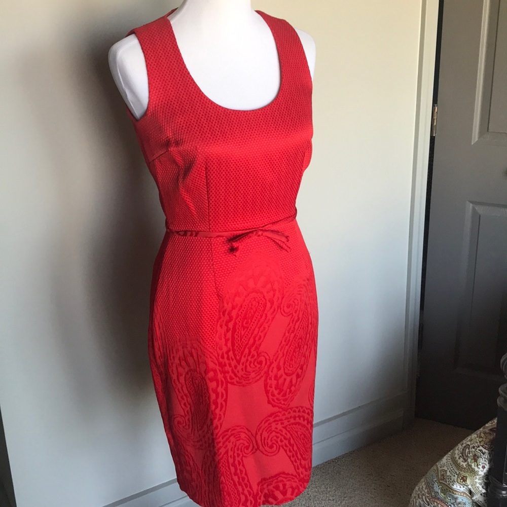 Ruby Red Dress with pattern around hem and bottom